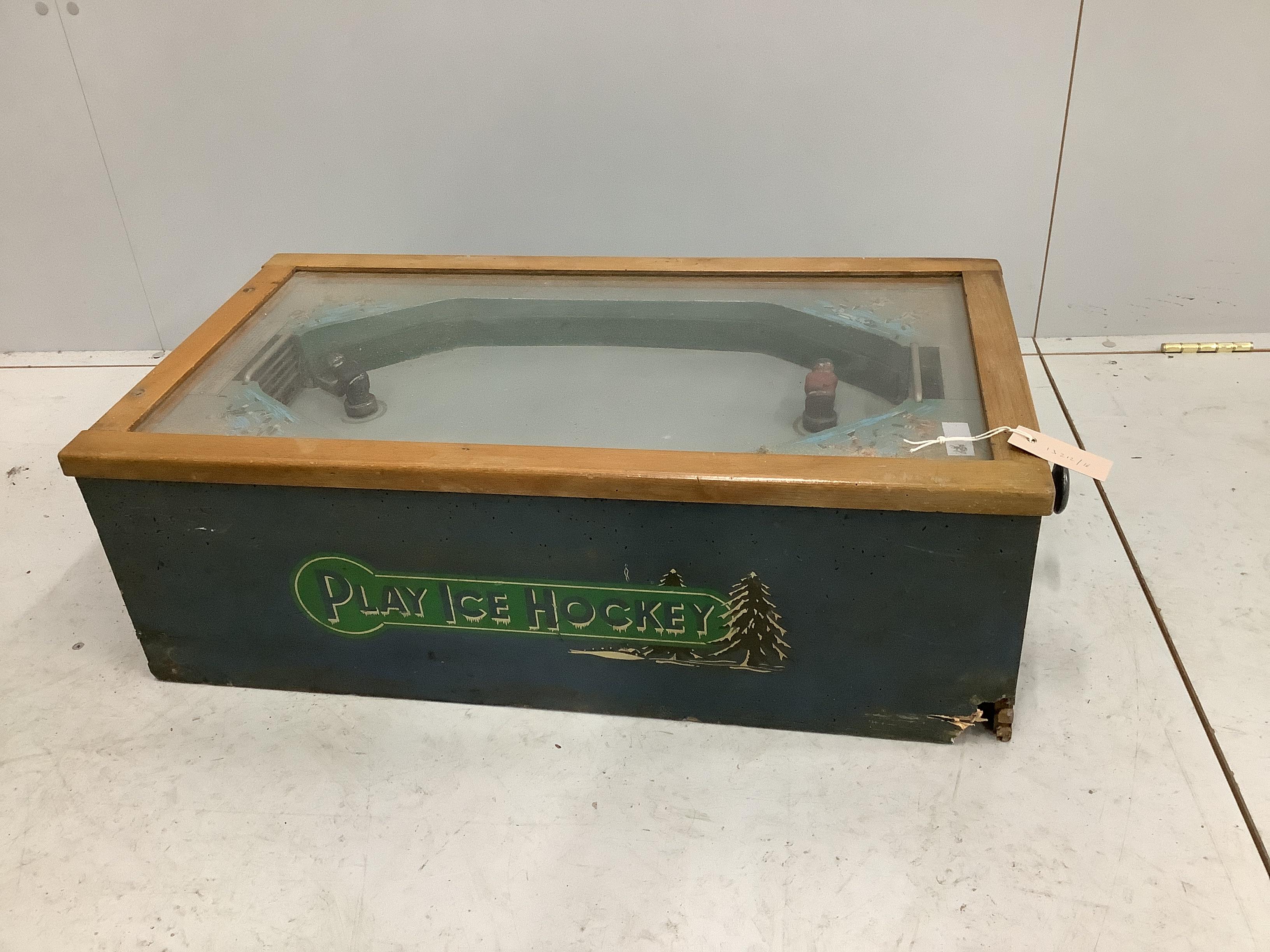 A vintage 'Play Ice Hockey' coin operated arcade game, width 81cm, depth 42cm, height 25cm (a.f.)